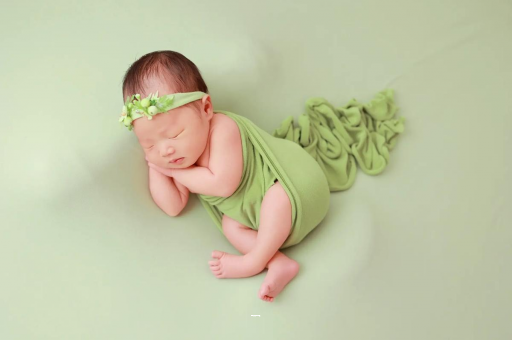 沅江宝宝多大才不会吐奶